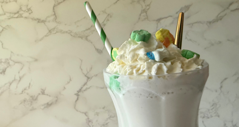 lucky charms on whipped cream topped shake